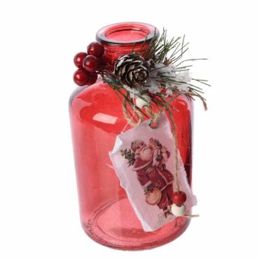 Bouteille rouge en verre avec décor du Père Noël sur tissu Bouteille rouge en verre avec décor du Père Noël sur tissu