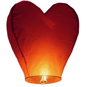 Lanterne volante en forme de cœur rouge illuminée dans la nuit | jourdefete.com