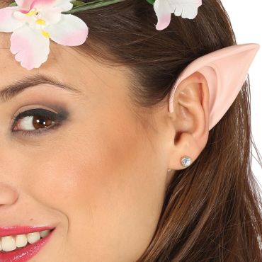Femme portant une prothèse pointue de petite oreille d'elfe avec une couronne de fleurs | jourdefete.com Femme portant une prothèse pointue de petite oreille d'elfe avec une couronne de fleurs | jourdefete.com